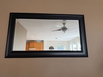 Large black thick border wall mirror