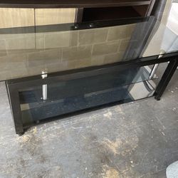 Real nice glass and metal base flat screen TV stand