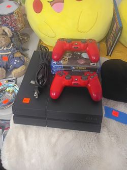 PlayStation 4 With Controllers And Games 