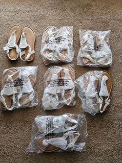 Man's and woman sandals new with tags.