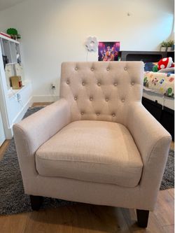 Beige upholstered, accent chair