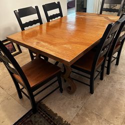 real wood dining table with chairs