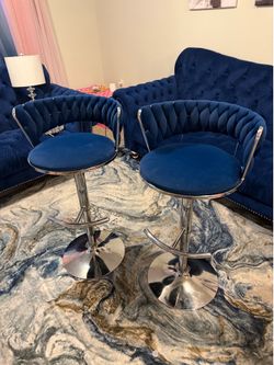 2 royal blue adjustable barstools