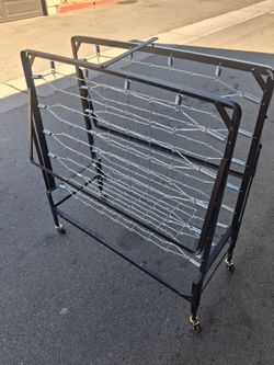 Spring folding rollaway bed frame