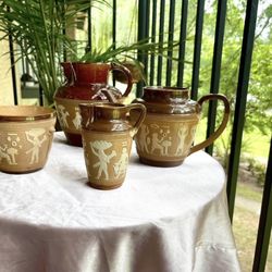 Royal Doulton or Doulton Lambeth Egyptian Revival Stoneware Jugs and Teapot. 4 pieces