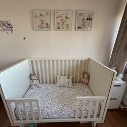 Potteryr Barn convertable crib with naturpedic mattress and organic cotton waterproof mattress cover