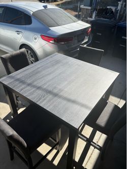 four-chair dining set
