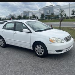 2 O O 3  TOYOTA COROLLA. $2,500 INICIAL. EL PRECIO DEL AUTO FINANCIADO ES $4,495