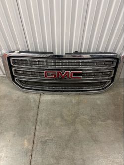OEM front grille assembly for a 2015–2020 GMC Yukon or Yukon XL.