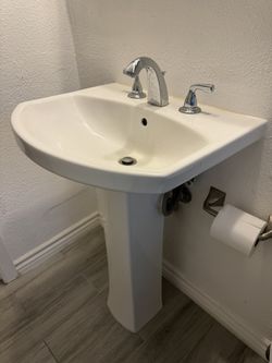 bathroom sink with stand and faucet, works good 