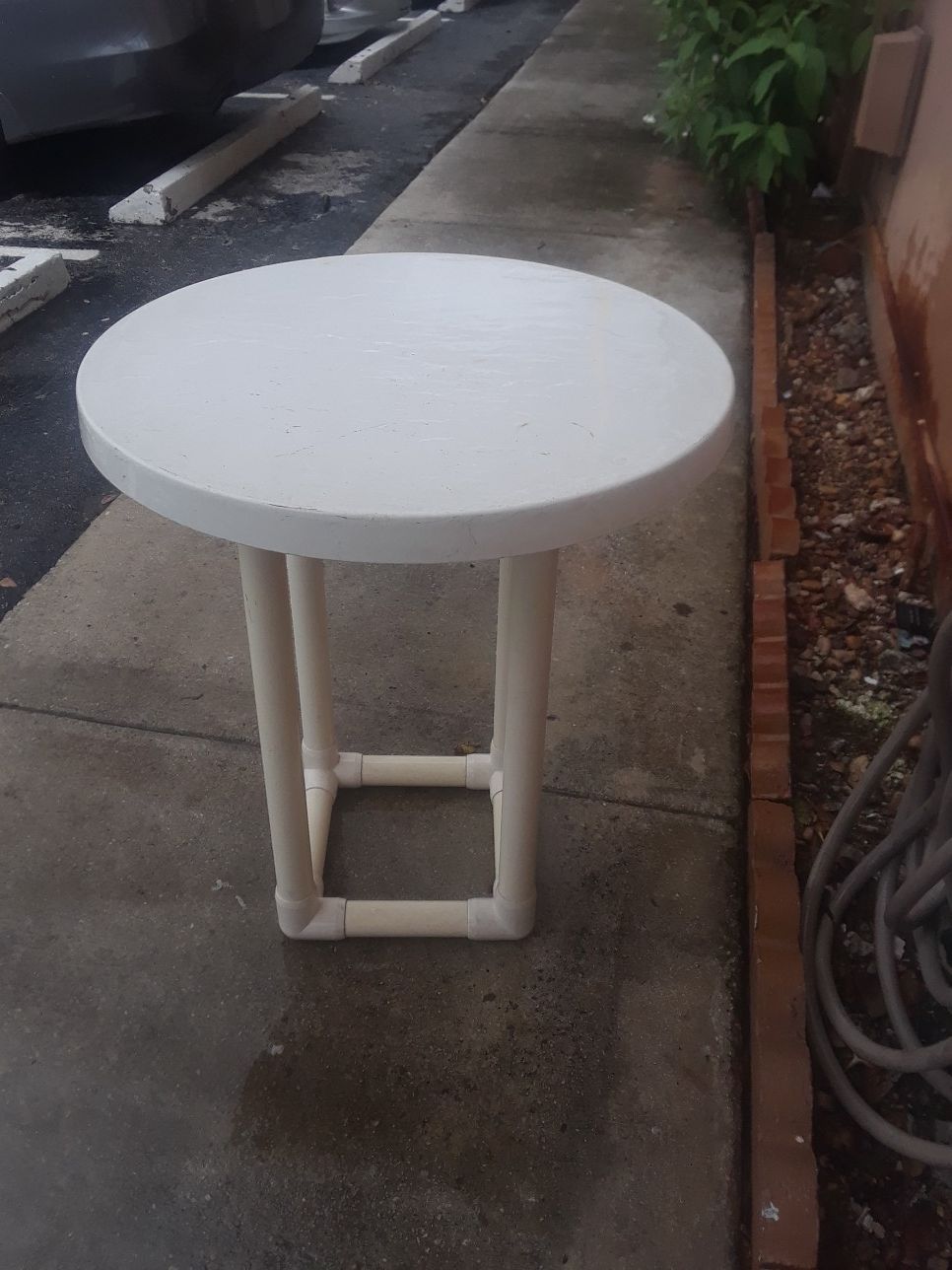 Plastic patio table $10