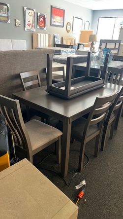 Ashley thanksgiving table sets with chairs or bench also some heavy captains chairs available for 1 customer