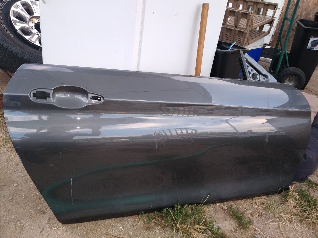 Mustang door has a scratch but it's really a very nice door