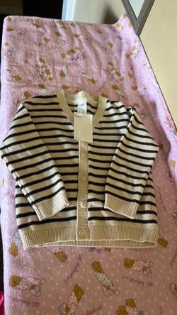 Two brand new long sleeve sweaters for kids size 2T$6.00each one
