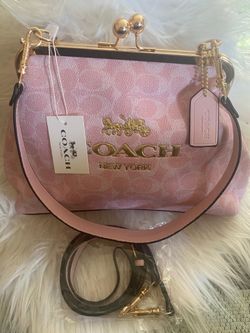 Coach women’s handbag.