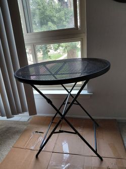 Round metal table is still available 28" H 28" W