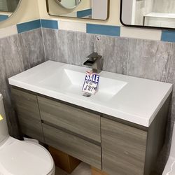 48” Wallmount vanity wood color softclose drawers doors with top white color sink integrated ready for pick up today