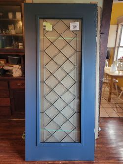 Blue main door with glass