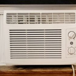 WINDOW AC  GE WINDOW AIR CONDITIONER UNIT 
