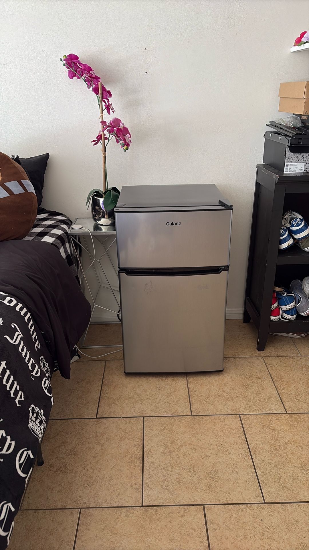 A Mini Fridge With A Freezer