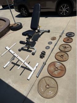 Adjustable bench and Olympic weight plates