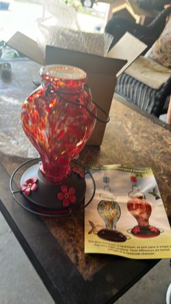 Glass hummingbird feeder
