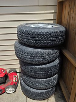 Bridgestone Dueler A/T Tires with Jeep Rims (Set of 5)