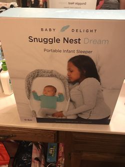 snuggle nest and clothes and pillow