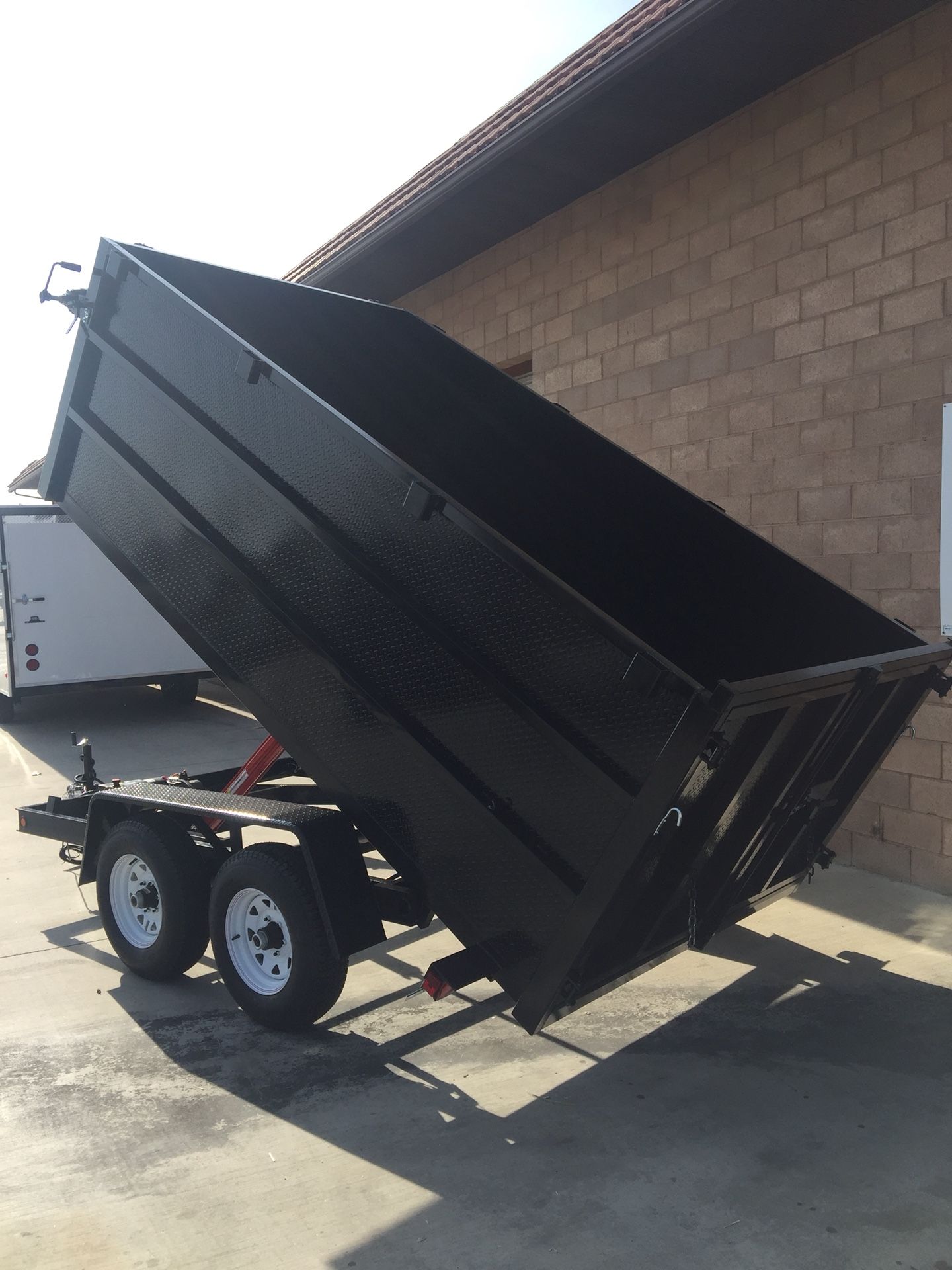 Brand new 8x12x4 HD dump trailer