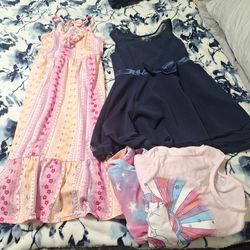 2 dresses  Size 6  . Pajamas Size 6/6x. 5 dollars for all three