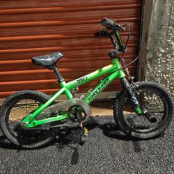 green Tony Hawk BMX-style boy's bicycle.