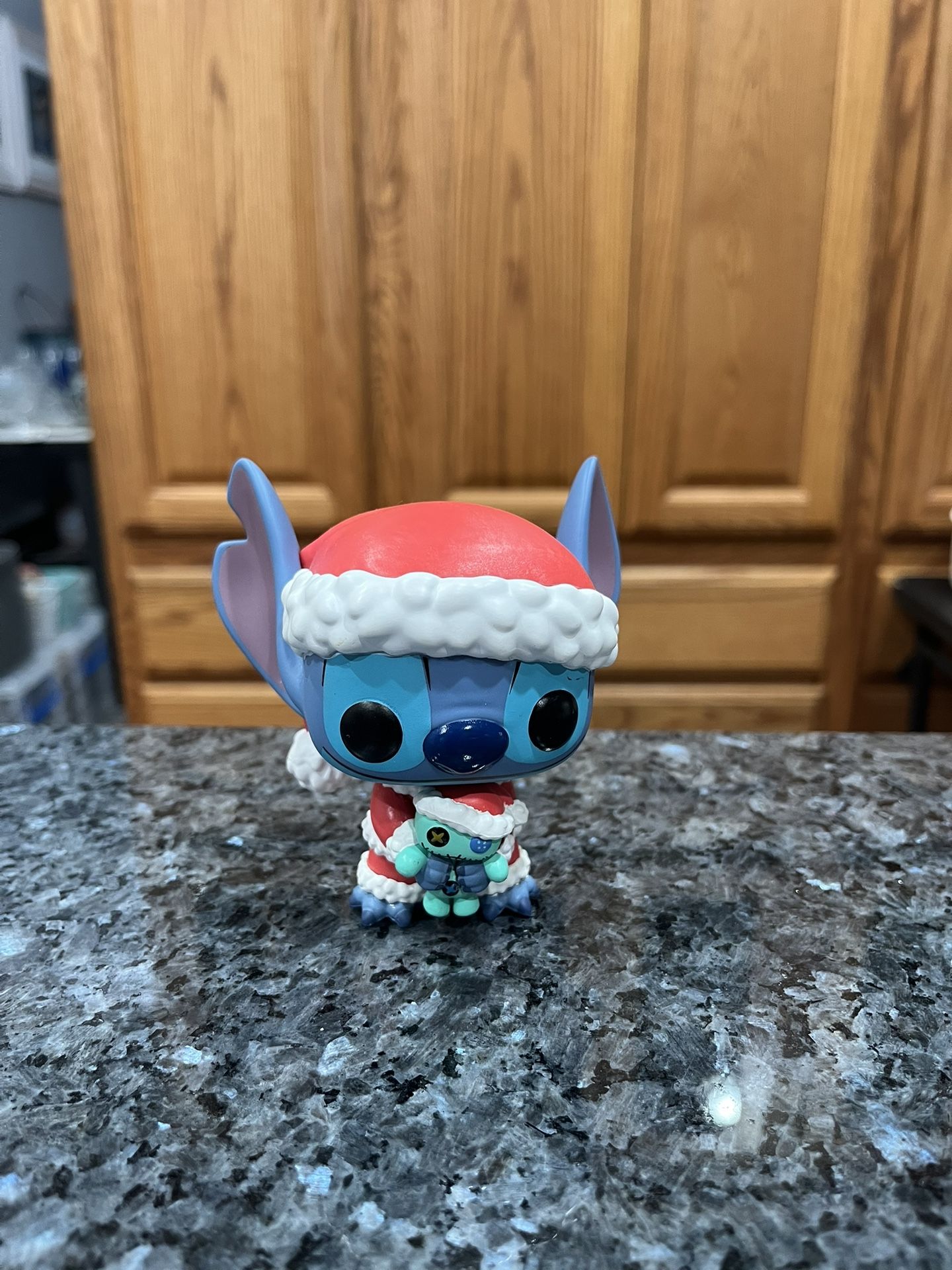 Funko Pop Disney Santa Stitch with Scrump #983 Hot Topic Exclusive Lilo & Stitch.  No box.  Has been on display in a cabinet with a Funko Pop Collecti