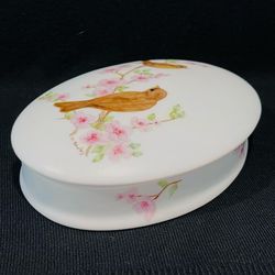 Vintage Porcelain Oval Trinket Box with Hand-Painted Bird & Pink Blossoms Signed. Beautiful trinket box , signed M.Rowrey, made in France in 1950’s