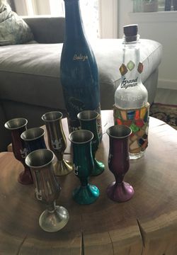 Collection of shot glasses and bottles