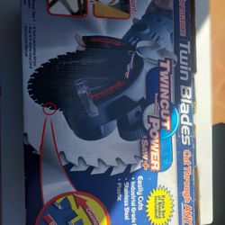 Twin power Electric Saw Brand new never use in the box.