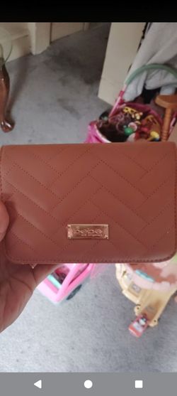 Bebe Los Angeles Brown Quilted crossbody bag! Brand new with tags. Really cute bag!