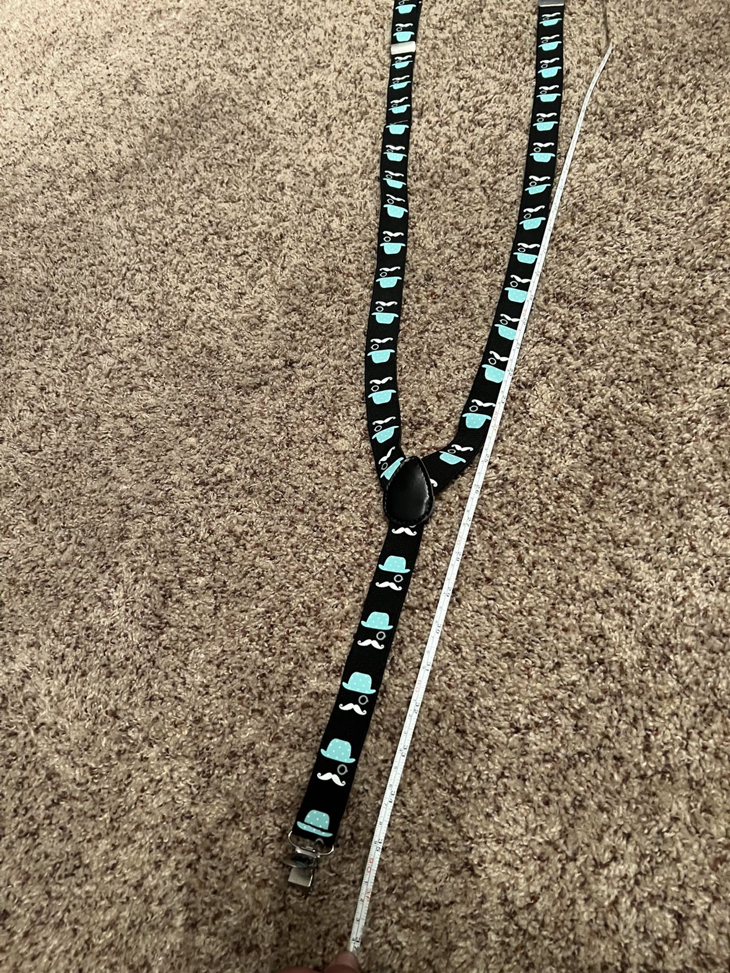 Super cute suspenders in good used condition. Adjustable. Size Small