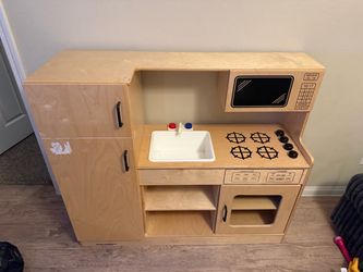 Child craft play kitchen with whiteboard