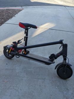 M365 scooter with suspension upgrades and seat