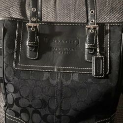 Black Coach leather tote bag
