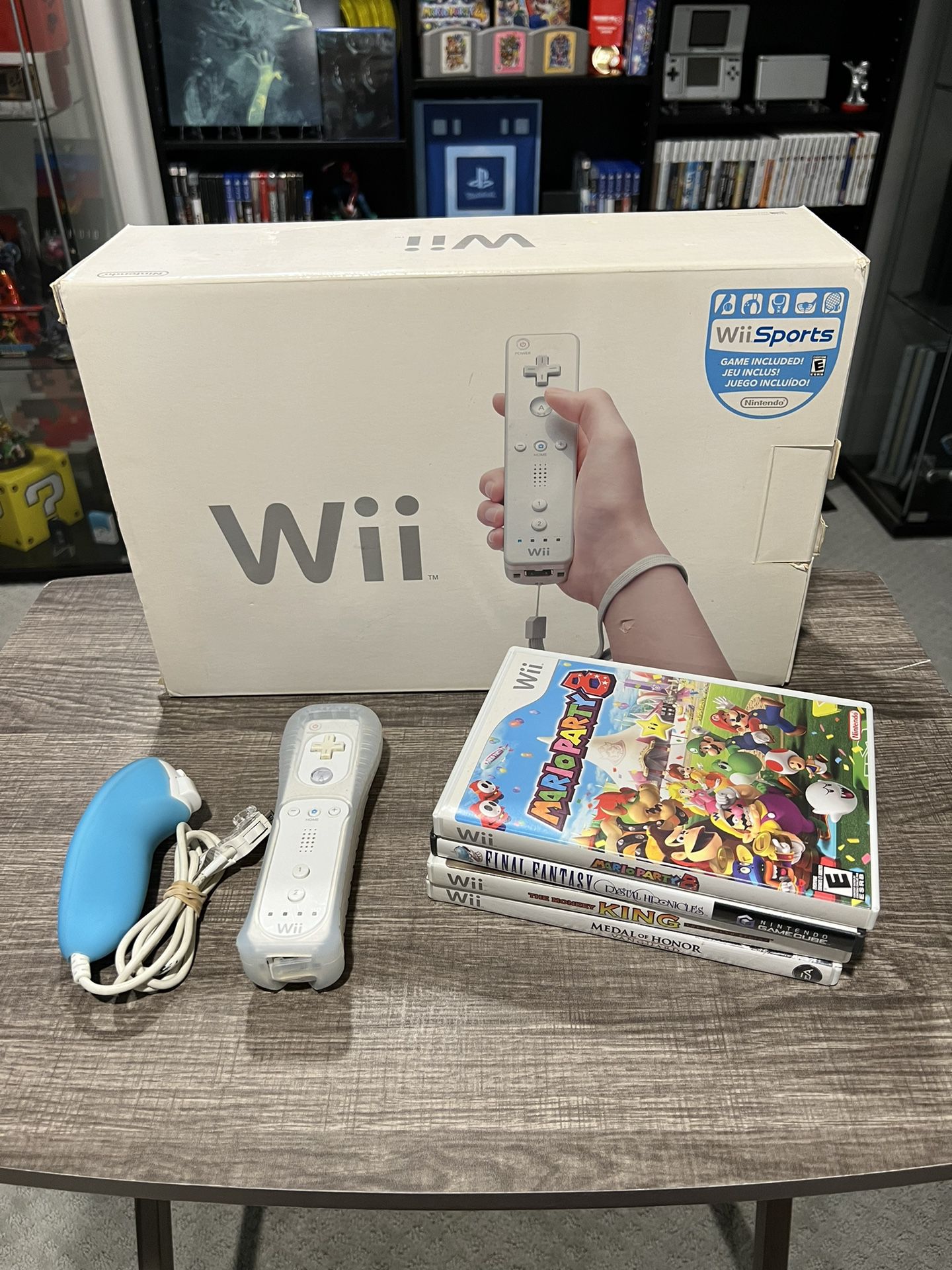 Nintendo Wii with Extra Controller, Extra Nunchuck, and Five Games - All CIB