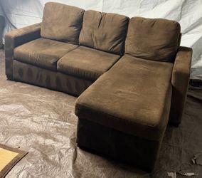 Brown couch with pullout bed and storage good condition clean we sell all the time delivery $40 local
