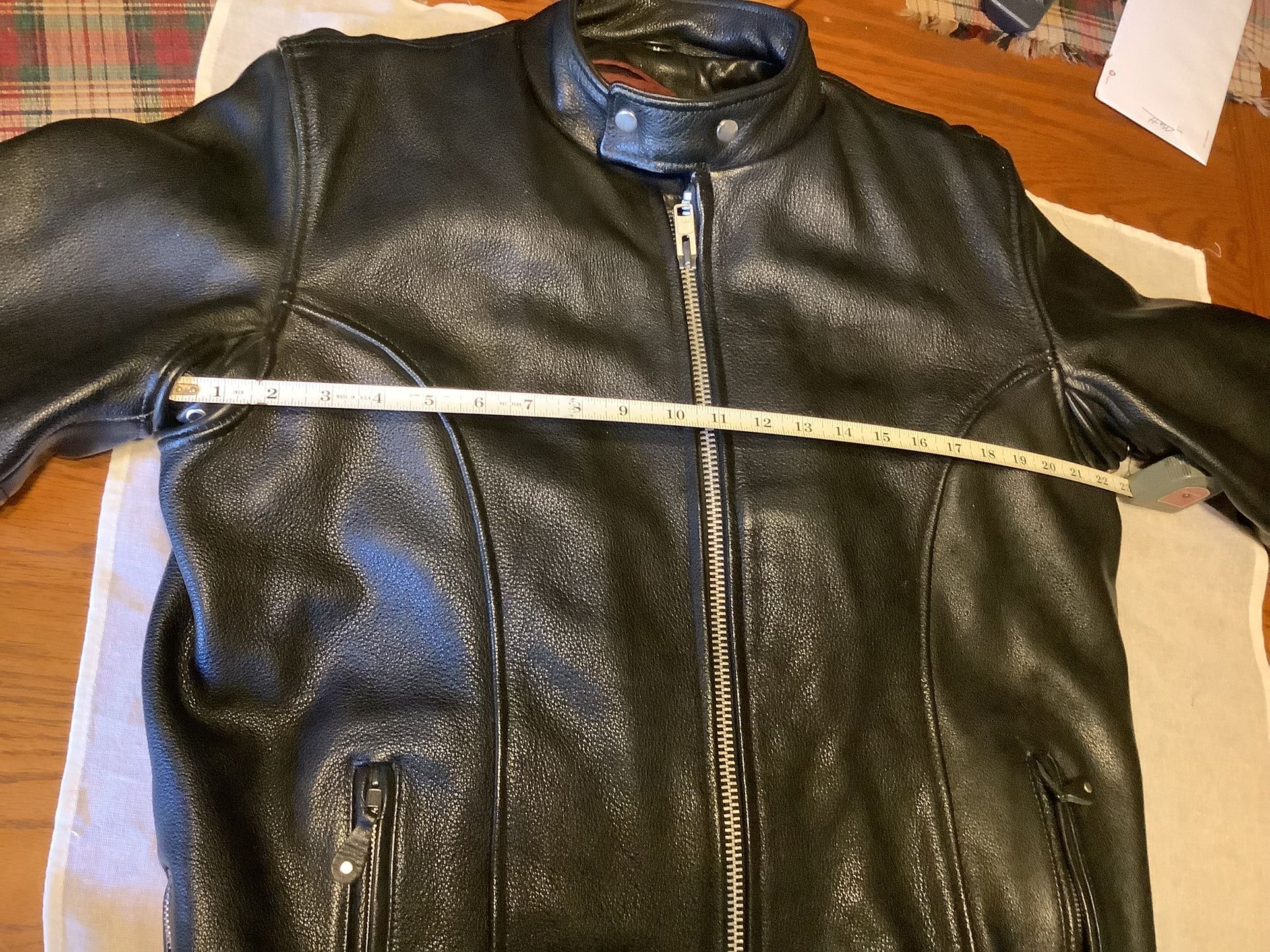 Leather motorcycle jacket by Jamin Leather size medium Harley Davidson all working zippers and snaps, 100% leather with removal liner Harley Davidson