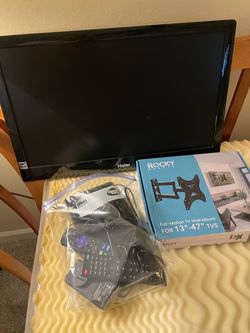 Haier 24” TV with wall bracket and Roku stick