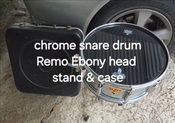 Chrome snare drum with Remo Ebony head, stand and case