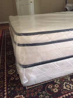 King pillow top mattress and box springs. New.