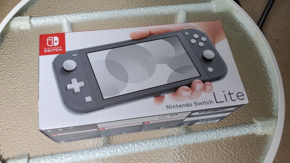 New! Nintendo Switch Lite grey console with game