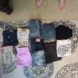 Size 4 And 5 Shorts.. Couple Shirts 