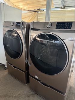 Samsung front load washer and electric dryer set