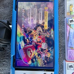 NINTENDO SWITCH OLED WITH MARIO GAMES LIKE NEW!!!